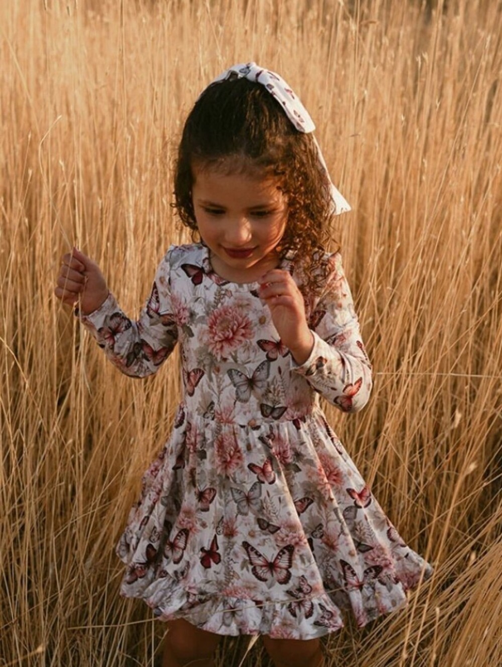 Posh Peanut Ruffled Twirl Dress in Blush Floral - Kids